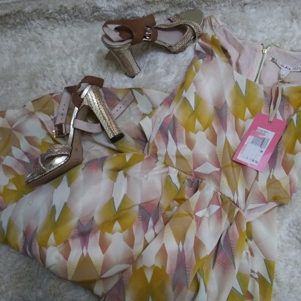 Chelsea Violet, revealing mango colored dress, M